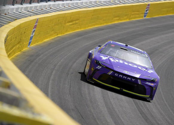 LAS VEGAS, NV - MARCH 15: Denny Hamlin ( 11 Joe Gibbs Racing Yahoo! Toyota) races through turn 3 during the middle laps of the NASCAR, Motorsport, USA Cup Series Pennzoil 400 on March 15, 2026, at Las Vegas Motor Speedway in Las Vegas, NV. (Photo by Will Lester Icon Sportswire) AUTO: MAR 15 NASCAR Cup Series Pennzoil 400 EDITORIAL USE ONLY Icon24031512918