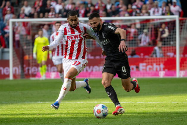 Duel between Linton Maina 1 FC Koeln, 37 and Franck Honorat Borussia Moenchengladbach, 09 1 FC Koeln vs Borussia Moenchengladbach, Football, 1 Bundesliga, 27 Matchday, Season 2025 2026, 21 03 2026 DFL DFB Regulations prohibit any use of Photographs as image sequences and or Quasivideo 1 FC Koeln vs Borussia Moenchengladbach, Football, 1 Bundesliga, 27 Matchday, Season 2025 2026, 21 03 2026 Koeln Copyright: xEibner-Pressefoto ThomasxHaeslerx EP_THR