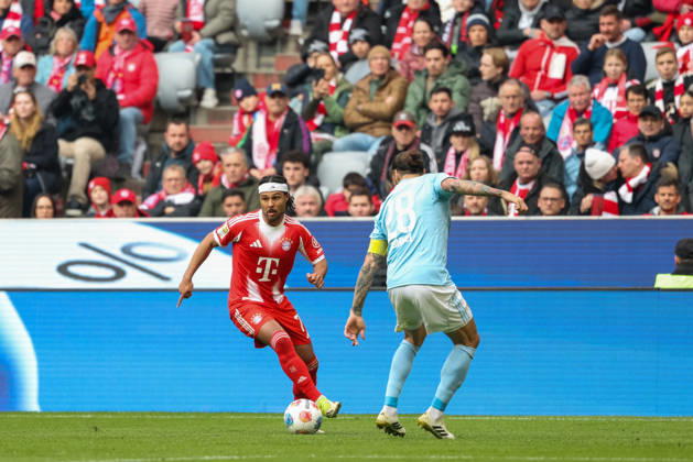 Serge Gnabry FC Bayern Muenchen, 07 with Christopher Trimmel 1 FC Union Berlin, 28 , GER, FC Bayern Muenchen vs 1 FC Union Berlin, Football, Bundesliga, Matchday 27, Season 2025 2026, 21 03 2026, DFL DFB REGULATIONS PROHIBIT ANY USE OF PHOTOGRAPHS as IMAGE SEQUENCES and or QUASI VIDEO, GER, FC Bayern Muenchen vs 1 FC Union Berlin, Football, Bundesliga, Matchday 27, Season 2025 2026, 21 03 2026 Muenchen Copyright: xEibner-Pressefoto JennixMaulx EP_JML