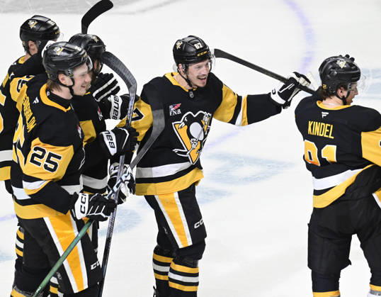 Pittsburgh Penguins right wing Rickard Rakell (67) celebrates his the overtime penalty shot goal in the Pittsburgh Penguins 5-4 win against the Winnipeg Jets at PPG Paints Arena in Pittsburgh on Saturday, March 21, 2026.  PIT2026032114 ARCHIExCARPENTER