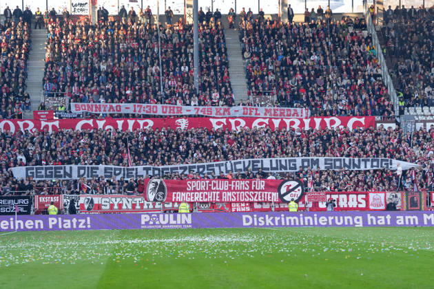 Banner of the fans and Ultras in the stands, Banner, Against the DFL, Kick-off times , Germany, Football, 1 Bundesliga, 27 Matchday, 2025 2026, FC St Pauli vs SC Freiburg, 22 03 2026, Millerntor Stadion, Hamburg, Germany DFL REGULATIONS PROHIBIT ANY USE OF PHOTOGRAPHS AS IMAGE SEQUENCES AND OR QUASI VIDEO Hamburg Millerntor Stadion Hamburg Germany Copyright: xArnexAmbergx