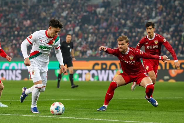 in duel, action, with Fabian Rieder 32 FC Augsburg , Maximilian Mittelstaedt 7 VfB Stuttgart , FC Augsburg vs VfB Stuttgart, Soccer, 1 Bundesliga, 27 Matchday, 22 03 2026 DFB regulations prohibit any use of photographs as image sequences and or quasi video Augsburg Bayern Germany Copyright: xkolbert-press ChristianxKolbertx