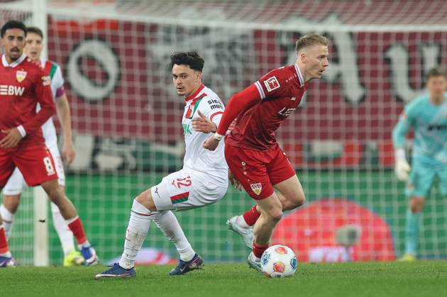 in duel, action, with Fabian Rieder 32 FC Augsburg , Chris Fuehrlich 10 VfB Stuttgart , FC Augsburg vs VfB Stuttgart, Football, 1 Bundesliga, 27 Matchday, 22 03 2026 DFB regulations prohibit any use of photographs as image sequences and or quasi video Augsburg Bayern Germany Copyright: xkolbert-press ChristianxKolbertx