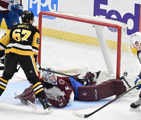 Pittsburgh Penguins right wing Rickard Rakell (67) scores on Colorado Avalanche goaltender Scott Wedgewood (41) in the third period of the Pittsburgh Penguins 6-2 lost at PPG Paints Arena in Pittsburgh on Tuesday, March 24, 2026.  PIT2026032421 ARCHIExCARPENTER