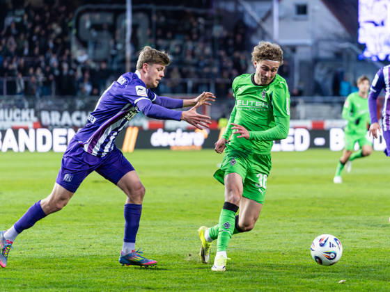 Hugo Bolin Borussia Moenchengladbach, 38 in duel against Frederik Christensen VfL Osnabrueck, 03 VfL Osnabrueck vs Borussia Moenchengladbach, Football, Test match, Season 2025 2026, 26 03 2026 DFB DFL REGULATIONS PROHIBIT ANY USE OF PHOTOGRAPHS AS IMAGE SEQUENCES AND OR QUASI VIDEO, VfL Osnabrueck vs Borussia Moenchengladbach, Football, Test match, Season 2025 2026, 26 03 2026 Osnabrueck Copyright: xEibner-Pressefoto DamianxKruczynskix EP_DKI