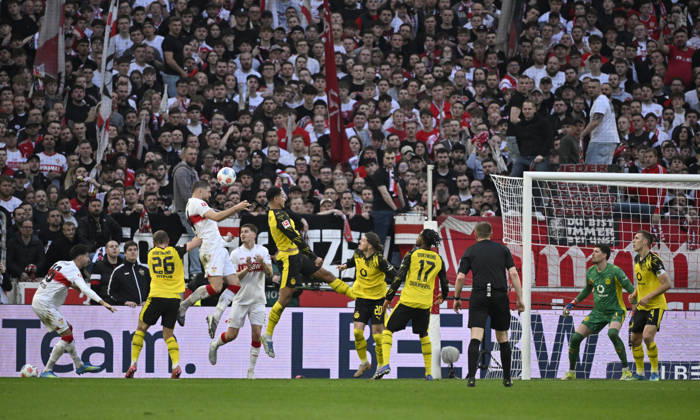 Penalty area scene, goal area scene Goal shot Action Goal chance Header duel Duel Action Jeff Chabot VfB Stuttgart 24 VfB Stuttgart vs Borussia Dortmund BVB 04 04 2026 DFL REGULATIONS PROHIBIT ANY USE OF PHOTOGRAPHS AS IMAGE SEQUENCES AND OR QUASI VIDEO VfB Stuttgart vs Borussia Dortmund BVB