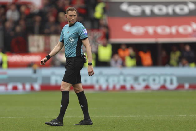 Referee Martin Petersen looks on during the Bundesliga match between Bayer 04 Leverkusen and VfL Wolfsburg, BayArena on April 04, 2026 in Leverkusen, Germany Photo by Oliver Kaelke DeFodi Images Referee Martin Petersen looks on during the Bundesliga match between Bayer 04 Leverkusen and VfL Wolfsburg at BayArena on April 4, 2026 in Leverkusen, Germany Photo by Oliver Kaelke DeFodi Images DFL regulations prohibit any use of photographs as image sequences and or quasi video Photo by Oliver Kaelke DeFodi Images