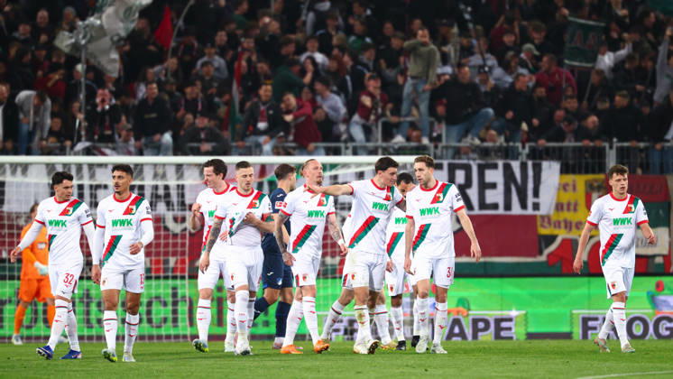 Team FC Augsburg Goal for 2 0 at the match between FC Augsburg v TSG 1899 Hoffenheim, Soccer, Men, Bundesliga, 2025 2026, 29 Matchday on 10 04 2026 in Augsburg, WWK ARENA DFL and DFB regulations prohibit any use of photographs as image sequences and or quasi video Bayern Germany