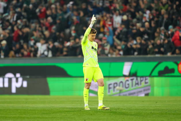 Finn Dahmen FC Augsburg, 01 celebrates the goal to 1 0, GER, FC Augsburg vs TSG 1899 Hoffenheim, Football, Bundesliga, Matchday 29, Season 2025 2026, 10 04 2026, DFL DFB REGULATIONS PROHIBIT ANY USE OF PHOTOGRAPHS as IMAGE SEQUENCES and or QUASI VIDEO, GER, FC Augsburg vs TSG 1899 Hoffenheim, Football, Bundesliga, Matchday 29, Season 2025 2026, 10 04 2026 Augsburg Copyright: xEibner-Pressefoto JennixMaulx EP_JML