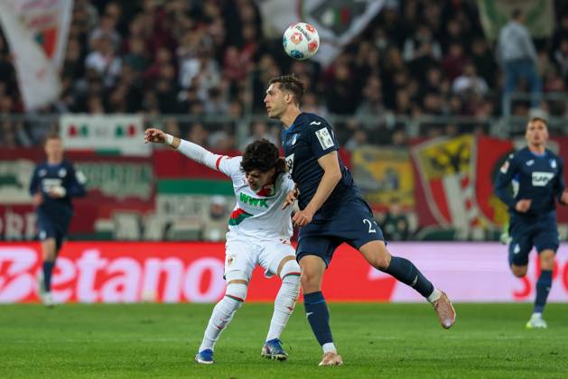 in duel, action, with Rodrigo Ribeiro 21 FC Augsburg , Robin Hranac 2 TSG 1899 Hoffenheim , FC Augsburg vs TSG 1899 Hoffenheim, Football, 1 Bundesliga, 29 Matchday, 10 04 2026 DFB regulations prohibit any use of photographs as image sequences and or quasi video Augsburg Bayern Germany Copyright: xkolbert-press ChristianxKolbertx