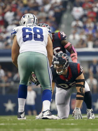 October 05, 2014: Houston Texans defensive end J.J. Watt (99) and Dallas Cowboys tackle Doug Free (68) during the NFL, American Football Herren, USA game between the Houston Texans and the Dallas Cowboys at AT&T Stadium in Arlington, TX. The Cowboys defeated the Texans 20-17 in overtime. Copyright: xTimxWarnerx