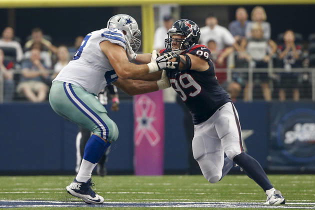 October 05, 2014: Houston Texans defensive end J.J. Watt (99) and Dallas Cowboys tackle Doug Free (68) during the NFL, American Football Herren, USA game between the Houston Texans and the Dallas Cowboys at AT&T Stadium in Arlington, TX. The Cowboys defeated the Texans 20-17 in overtime. Copyright: xTimxWarnerx