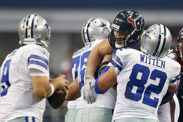 October 05, 2014: Houston Texans defensive end J.J. Watt (99) is blocked by Dallas Cowboys tight end Jason Witten (82) while rushing the the quarterback during the NFL, American Football Herren, USA game between the Houston Texans and the Dallas Cowboys at AT&T Stadium in Arlington, TX. The Cowboys defeated the Texans 20-17 in overtime. Copyright: xTimxWarnerx
