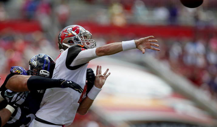 Oct. 12, 2014 - Tampa, FL, USA - Tampa Bay Buccaneers quarterback Mike Glennon (8) is hurried by Baltimore Ravens nose tackle Haloti Ngata (92) as he releases for an incomplete pass, bringing up a fourth down, at the beginning of the second quarter on Sunday, Oct. 12, 2014, at Raymond James Stadium in Tampa, Fla. Copyright: xDirkxShaddx