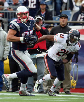 Oct. 26, 2014 - Foxborough, MA, USA - New England Patriots tight end Rob Gronkowski (87) pushes away Chicago Bears strong safety Ryan Mundy (21) on his way to a touchdown in the third quarter Sunday, Oct. 26, 2014 at Gillette Stadium in Foxborough, Mass. The Patriots defeated the Bears 51-23. Copyright: xBrianxCassellax