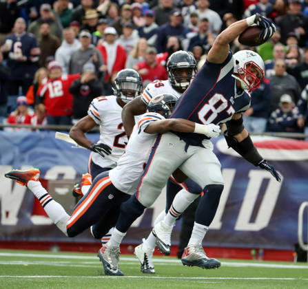 Oct. 26, 2014 - Foxborough, MA, USA - New England Patriots tight end Rob Gronkowski (87) runs through a tackle attempt by Chicago Bears defensive back Al Louis-Jean (39) for a touchdown in the third quarter Sunday, Oct. 26, 2014 at Gillette Stadium in Foxborough, Mass. The Patriots defeated the Bears 51-23. Copyright: xBrianxCassellax