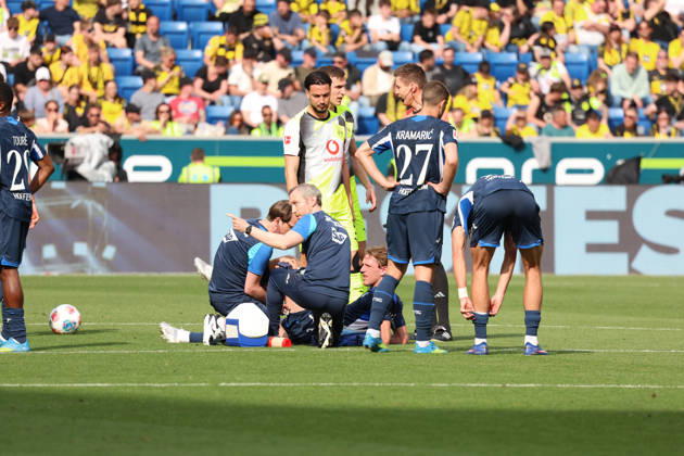 18 04 2026, xrekx, Fussball 1 Bundesliga, TSG 1899 Hoffenheim Borussia Dortmund v l Wouter Burger TSG 1899 Hoffenheim verletzt, Verletzung, Schmerz, Schmerzen, injured, injury, pain, pains DFL DFB REGULATIONS PROHIBIT ANY USE OF PHOTOGRAPHS as IMAGE SEQUENCES and or QUASI VIDEO Sinsheim