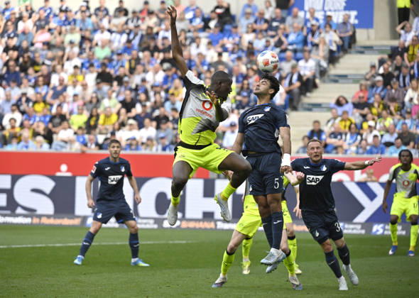 Penalty area scene, goal area scene header duel duel action Serhou Guirassy Borussia Dortmund BVB 09 vs Ozan Kabak TSG 1899 Hoffenheim 05 TSG 1899 Hoffenheim vs Borussia Dortmund BVB 18 04 2026 DFL REGULATIONS PROHIBIT ANY USE OF PHOTOGRAPHS AS IMAGE SEQUENCES AND OR QUASI VIDEO TSG 1899 Hoffenheim vs Borussia Dortmund