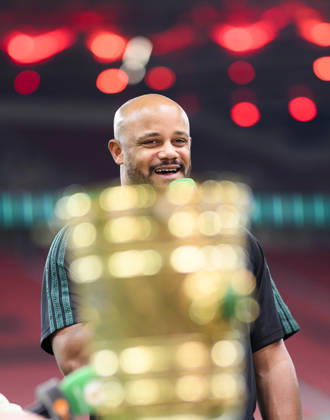 Coach Vincent Kompany Bayern Munich stands behind the DFB Pokal, laughs, good mood after the match Soccer DFB Pokal Semifinal Bayer 04 Leverkusen Bayern Munich, on 22 04 2026 in Leverkusen Germany BayArena