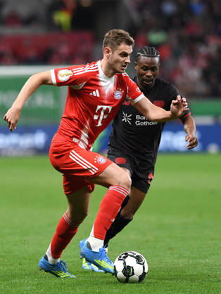 Josip Stanisic FC Bayern Muenchen and Nathan Tella Bayer 04 Leverkusen in a duel during the DFB Cup semifinal match between Bayer 04 Leverkusen v FC Bayern Munich, BayArena on April 22, 2026 in Leverkusen, Germany Photo by Ralf Treese DeFodi Images Josip Stanisic FC Bayern Muenchen and Nathan Tella Bayer 04 Leverkusen battle for the ball during the DFB Cup semifinal match between Bayer 04 Leverkusen and FC Bayern München at BayArena on April 22, 2026 in Leverkusen, Germany Photo by Ralf Treese DeFodi Images