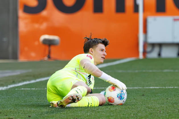 Finn Dahmen 1, FC Augsburg keeps the ball safe during the match between FC Augsburg v Eintracht Frankfurt, Football, Men, Bundesliga, 2025 2026, 31 Matchday on 25 04 2026 in Augsburg, WWK ARENA DFL and DFB regulations prohibit any use of photographs as image sequences and or quasi video Bayern Germany