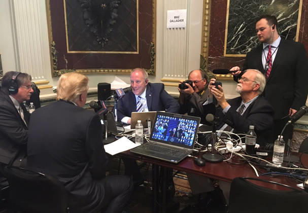 October 17, 2017 - Washington, DC, United States of America - U.S. President Donald Trump speaks with conservative radio talkshow host Mike Gallagher as the White House hosts a talk radio row in the Old Executive Office Building October 17, 2017 in Washington, DC. Trump is hoping to appeal directly to his grassroots through conservative talk radio to push for his tax reform program. Copyright: xWhitexHousex