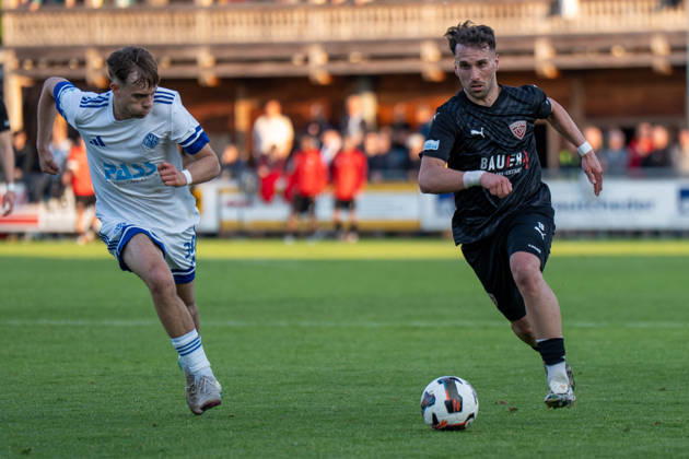 Soccer Men Regionalliga Bayern Season 2025 2026 33 Matchday 08 05 2026 TSV Buchbach Viktoria Aschaffenburg SMR Arena Matvey Obolkin L of SV Viktoria Aschaffenburg in a duel with Samed Bahar R of TSV Buchbach Buchbach SMR Arena Bavaria Germany