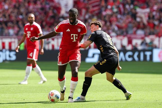 in duel, action, with Dayot Upamecano 2 FC Bayern Muenchen , Eric Martel 6 1 FC Koeln , FC Bayern Muenchen vs 1 FC Koeln, Football, 1 Bundesliga, 34 Matchday, 16 05 2026 DFL DFB regulations prohibit any use of photographs as image sequences and or quasi video Muenchen Bayern Germany Copyright: xkolbert-press ChristianxKolbertx