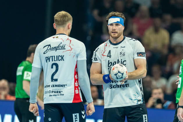 Simon Pytlick SG Flensburg Handewitt and Johannes Golla SG Flensburg Handewitt speaks with during the handball semi final of the Winamax EHF Finals 2026 between MT Melsungen and SG Flensburg Handewitt at Barclays Arena on May 30, 2026 in Hamburg, Germany