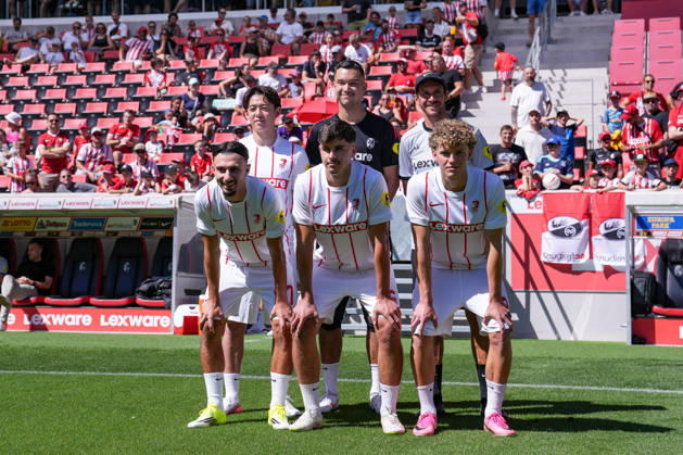 Julian Schuster, SC Freiburg, coach with new signings Rihito Yamamoto, SC Freiburg, 20, Mio Backhaus, SC Freiburg, Berkay Yilmaz, SC Freiburg, 27, Karl Steinmann, SC Freiburg, 36, and Rouven Tarnutzer, SC Freiburg, 39, fans in the background, Germany, soccer, Bundesliga 1, 2026–2027, SC Freiburg, public training session, July 12, 2026, Europa-Park Stadium, Freiburg, Freiburg, Europa-Park Stadium, Baden-Württemberg, Germany Copyright: xArnexAmbergx