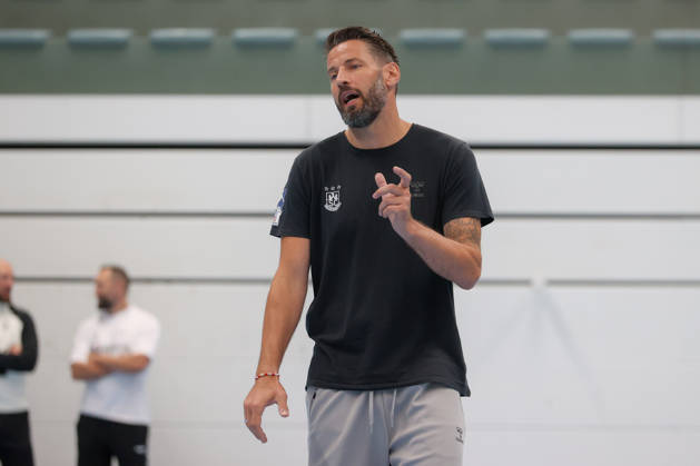 July 22, 2026, xtgx, Handball, Opel HBL, SC Magdeburg: First training session of the season by Bennet Wiegert in Magdeburg; coach gives instructions, gesturing with his arms, gesticulate, gives instructions in Magdeburg