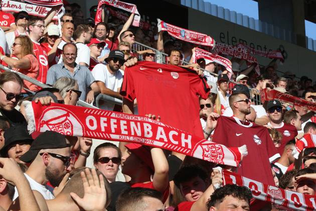 July 29, 2026 xmgoodx Offenbach am Main, Pluto Stadium at Bieberer Berg Anniversary Match: Kickers Offenbach OFC vs. VfB Stuttgart Fans from Offenbach wearing scarves