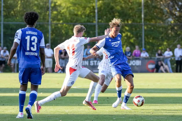v li Bernardo Fernandes da Silva Junior (Hoffenheim), 13, Alexander Bernhardsson (Kiel), 11, Luis Engelns (Hoffenheim), 16, tackle, game scene, duel, tackle, tackling, dynamics, action, 07 29 2026, Zuzenhausen, Germany, soccer, friendly match, TSG 1899 Hoffenheim vs. Holstein Kiel, DFB and DFL regulations prohibit any use of photographs as image sequences and or quasi-video xozx