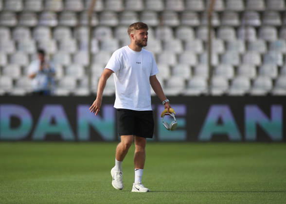 Soccer, Men s, Bavarian Regional League, 2026–2027 Season, TSV 1860 Munich vs. FC Augsburg II, Grünwalder Stadium: Matthew Collins of TSV 1860 Munich during the field inspection