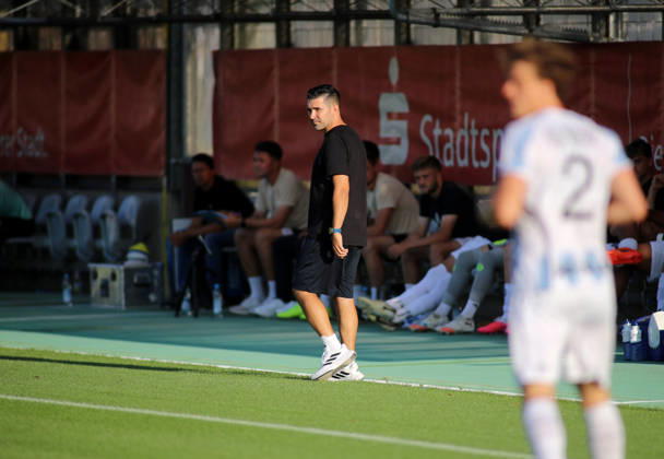 Soccer, Men s, Bavarian Regional League, 2026–2027 Season, TSV 1860 Munich vs. FC Augsburg II, Grünwalder Stadium; Alper Kayabunar, coach of TSV 1860 Munich, looking to the left while standing on the sideline