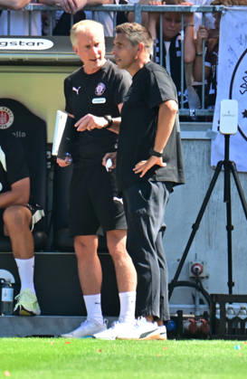 August 8, 2026, GER Soccer, Men, 2nd Division, Matchday 1, 2026–2027 Season, Hamburg, FC St. Pauli vs. SpVgg Greuther Fürth Coach Marcel Rapp of St. Pauli talks with assistant coach Jens Schuster. St. Pauli. DFB and DFL regulations prohibit any use of photographs as image sequences and or quasi-video. Hamburg, Millerntorstadion, Hamburg, Germany Copyright: xnordphotoxGmbH xWitkex