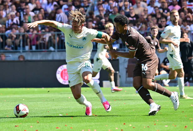 August 8, 2026, German Soccer, Men s, 2nd Division, Matchday 1, 2026–2027 Season, Hamburg, FC St. Pauli vs. SpVgg Greuther Fürth: Joel Chima Fujita (Pauli, No. 16) tries to get past Felix Klaus (Fürth, No. 30). DFB and DFL regulations prohibit any use of photographs as image sequences and or quasi-video. Hamburg Millerntorstadion, Hamburg, Germany Copyright: xnordphotoxGmbH xWitkex