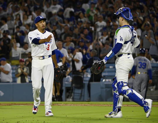 Los Angeles Dodgers closing pitcher Edwin Diaz celebrates with catcher Hunter Feduccia after securing his first save of August , closing out a 6-5 win over the Kansas City Royals after two blown saves in Arizona at Dodger Stadium in Los Angeles on Monday, August 10, 2026. LAP2026081002 JIMxRUYMEN