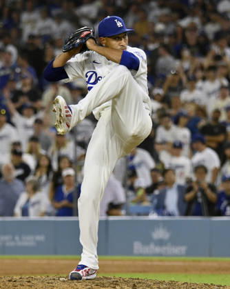 Los Angeles Dodgers closing pitcher Edwin Diaz winds up to deliver against the Kansas City Royals at Dodger Stadium in Los Angeles on Monday, August 10, 2026. LAP2026081004 JIMxRUYMEN