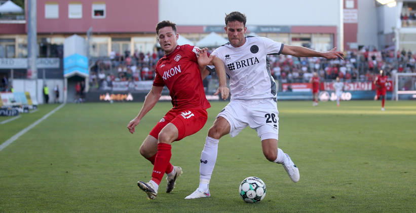 August 14, 2026, xfsx, Men s, Soccer, 2026–2027 Season, 3rd Division, Matchday 2: FC Würzburger Kickers vs. SV Wehen Wiesbaden; from left: Tim Kraus (FC Würzburger Kickers), Jakob Lewald (SV Wehen Wiesbaden); Würzburg, AKON ARENA, Bavaria, Germany