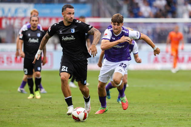August 15, 2026, xkwix, Soccer, 2. Bundesliga, VfL Osnabrück 1 FC Magdeburg, Stadion an der Bremer Brücke, Matchday 2, 2026–2027 Season: Falko Michel (1 FC Magdeburg) 21 in a tackle against Bernd Riesselmann (VfL Osnabrück) 22. DFB regulations prohibit any use of photographs as image sequences and or quasi-video. Photo: xKamilxWilkowskixPressefotoKochx, Lower, Germany