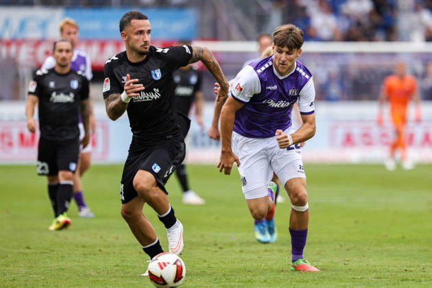 August 15, 2026, xkwix, Soccer, 2. Bundesliga, VfL Osnabrück 1 FC Magdeburg, Stadion an der Bremer Brücke, Matchday 2, 2026–2027 Season: Falko Michel (1 FC Magdeburg) 21 in a tackle against Bernd Riesselmann (VfL Osnabrück) 22. DFB regulations prohibit any use of photographs as image sequences and or quasi-video. Photo: xKamilxWilkowskixPressefotoKochx, Lower, Germany