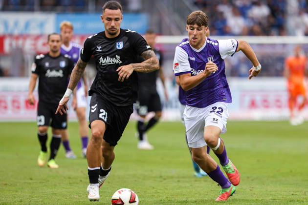 August 15, 2026, xkwix, Soccer, 2. Bundesliga, VfL Osnabrück 1 FC Magdeburg, Stadion an der Bremer Brücke, Matchday 2, 2026–2027 Season: Falko Michel (1 FC Magdeburg) 21 in a tackle against Bernd Riesselmann (VfL Osnabrück) 22. DFB regulations prohibit any use of photographs as image sequences and or quasi-video. Photo: xKamilxWilkowskixPressefotoKochx, Lower, Germany