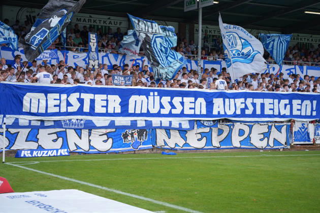 German Soccer, 3rd Division, Matchday 2, Hänsch Arena, SV Meppem vs. SG Sonnenhof Großaspach— Champions Must Be Promoted banner in the Meppen section Copyright: xMichelxWittex