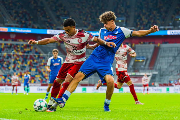 Steven van der Sloot of Fortuna Düsseldorf (No. 02) is pressured by Maximilian Theuer of TSG Hoffenheim II (No. 47) during a tackle. Fortuna Düsseldorf vs. TSG Hoffenheim II, Soccer, 3. Liga, Matchday 02, 2026–27 Season, August 15, 2026, DFL regulations prohibit any use of photographs as image sequences and or quasi-video, Fortuna Düsseldorf vs. TSG Hoffenheim II, soccer, 3. Liga, Matchday 2, 2026–27 Season, August 15, 2026, Düsseldorf Copyright: xEibner-Pressefoto LukasxBaldygax EP_LBA