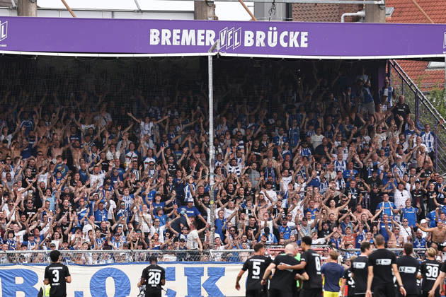 August 15, 2026, xkwix, Soccer, 2. Bundesliga, VfL Osnabrück 1 FC Magdeburg, Stadion an der Bremer Brücke, Matchday 2, 2026–2027 season. The Magdeburg away fans celebrate the victory. DFB regulations prohibit any use of photographs as image sequences and or quasi-video. Photo: xKamilxWilkowskixPressefotoKochx, Lower Saxony, Germany