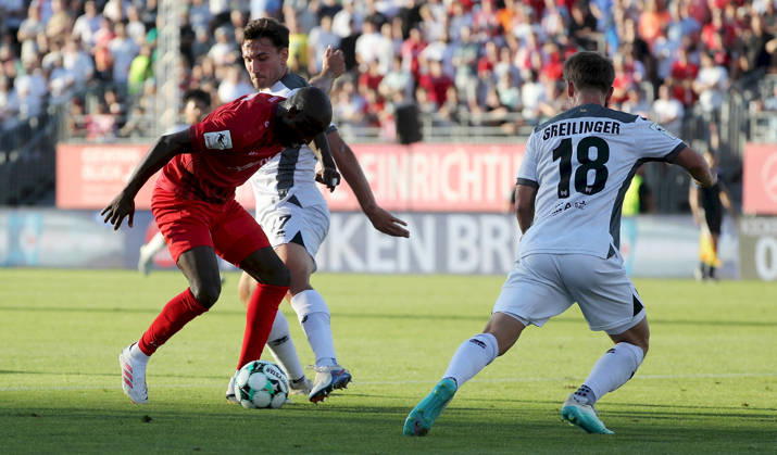 August 14, 2026, xfsx, Men s, Soccer, 2026–2027 Season, 3rd Division, Matchday 2: FC Würzburger Kickers vs. SV Wehen Wiesbaden; from left: David Kinsombi (FC Würzburger Kickers), David Suarez (SV Wehen Wiesbaden), Fabian Greilinger (SV Wehen Wiesbaden); Würzburg, AKON ARENA, Bavaria, Germany