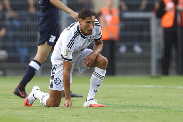 Younes Ebnoutalib of Eintracht Frankfurt looks at the ground during the first-round match of the DFB Cup between SC St. Toenis and Eintracht Frankfurt at Grotenburg Stadium on August 21, 2026, in Krefeld, Germany. Photo by Oliver Kaelke, DeFodi Images. Younes Ebnoutalib of Eintracht Frankfurt looks on, lying on the ground during the first-round match of the DFB Cup between SC St. Toenis and Eintracht Frankfurt at Grotenburg Stadium on August 21, 2026 in Krefeld, Germany. Photo by Oliver Kaelke, DeFodi Images. DFB and DFL regulations prohibit any use of photographs as image sequences and or quasi-video. Photo by Oliver Kaelke, DeFodi Images.