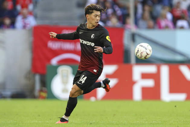 Yuito Suzuki of SC Freiburg in action, on the ball, making a solo run during the first-round DFB Cup match between Fortuna Düsseldorf and SC Freiburg at the Merkur Spiel Arena on August 23, 2026, in Düsseldorf, Germany. Photo by Oliver Kaelke, DeFodi Images. Yuito Suzuki of SC Freiburg controls the ball during the first-round match of the DFB Cup between Fortuna Düsseldorf and SC Freiburg at Merkur Spiel Arena on August 23, 2026 in Düsseldorf, Germany. Photo by Oliver Kaelke, DeFodi Images. DFB and DFL regulations prohibit any use of photographs as image sequences and or quasi-video. Photo by Oliver Kaelke, DeFodi Images.