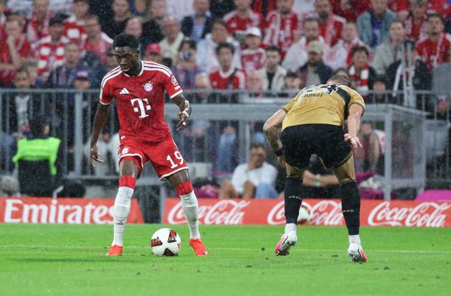 August 28, 2026, GER, Soccer, Men s, 1. Bundesliga, 2026–2027 Season, Matchday 1, FC Bayern Munich vs. VfB Stuttgart: Alphonso Davies (FC Bayern Munich, No. 19) on the ball and Jeff Chabot (VfB Stuttgart, No. 24). DFB and DFL regulations prohibit any use of photographs as image sequences and or quasi-video. Munich, Allianz Arena, Bayern, Germany Copyright: xNordphoto Schneiderx